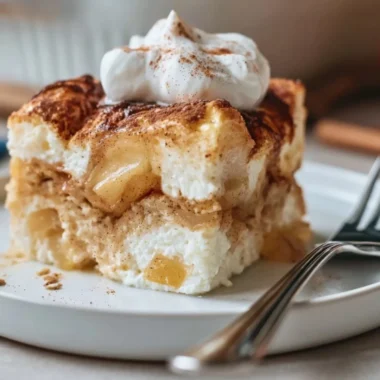 Baked apple and cinnamon dish with cottage cheese in a cozy setting