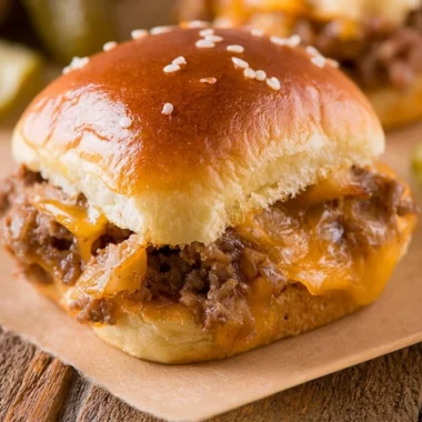 Cozy cheeseburger sliders served on a platter with toppings