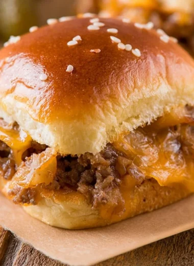 Cozy cheeseburger sliders served on a platter with toppings