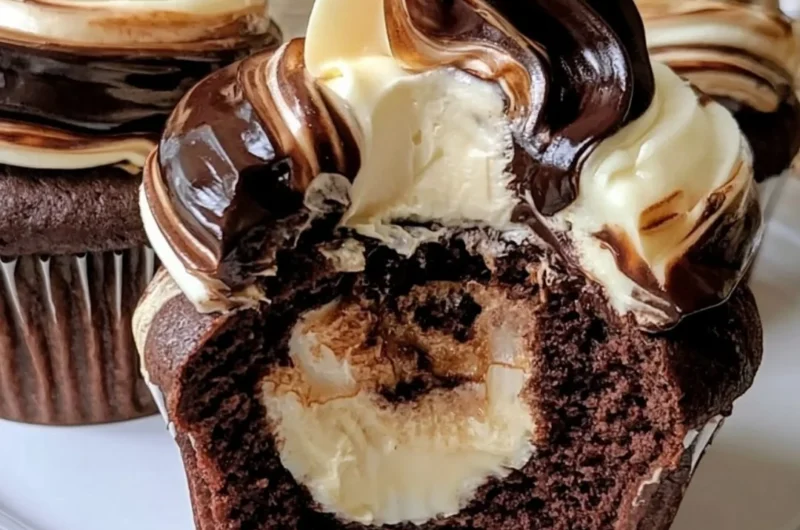 Delicious cozy chocolate coffee cupcakes topped with creamy frosting.