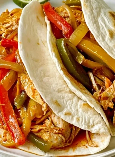 Cozy slow cooker chicken fajitas served with fresh vegetables