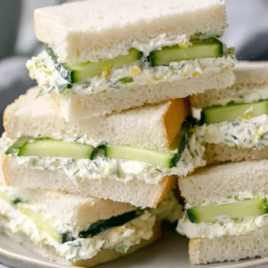 Delicious cucumber tea sandwich served on a plate, ideal for tea time.