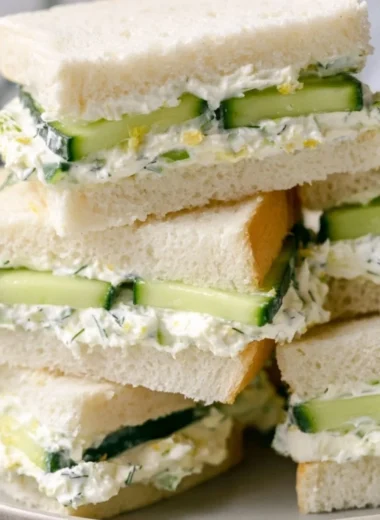 Delicious cucumber tea sandwich served on a plate, ideal for tea time.