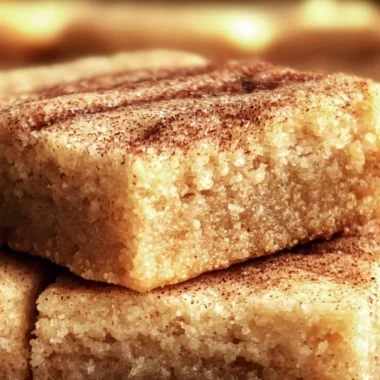Delicious, chewy snickerdoodle cookie bars topped with cinnamon sugar