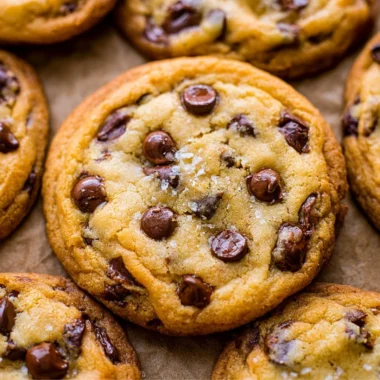 Freshly baked everyday chocolate chip cookies on a cooling rack
