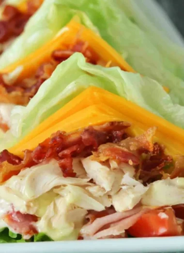 Keto and low carb chicken club sandwich with fresh ingredients and toppings