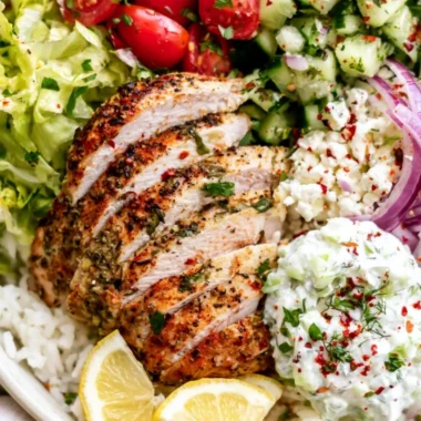 Lemon Herb Greek Chicken Bowls served with fresh vegetables and grains
