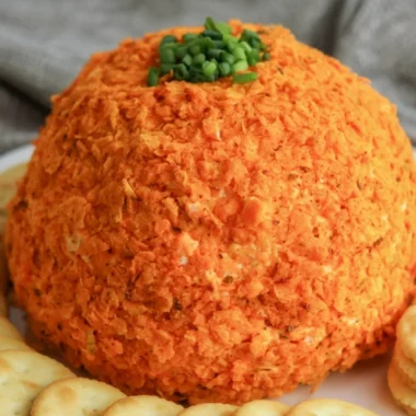 Homemade Nacho Cheese Ball served with chips and vegetables