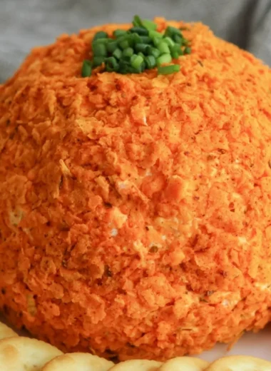 Homemade Nacho Cheese Ball served with chips and vegetables