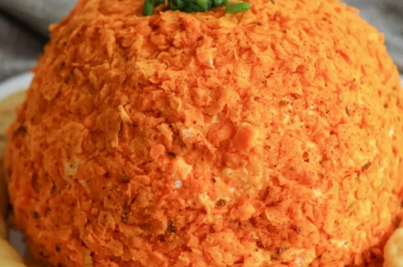 Homemade Nacho Cheese Ball served with chips and vegetables