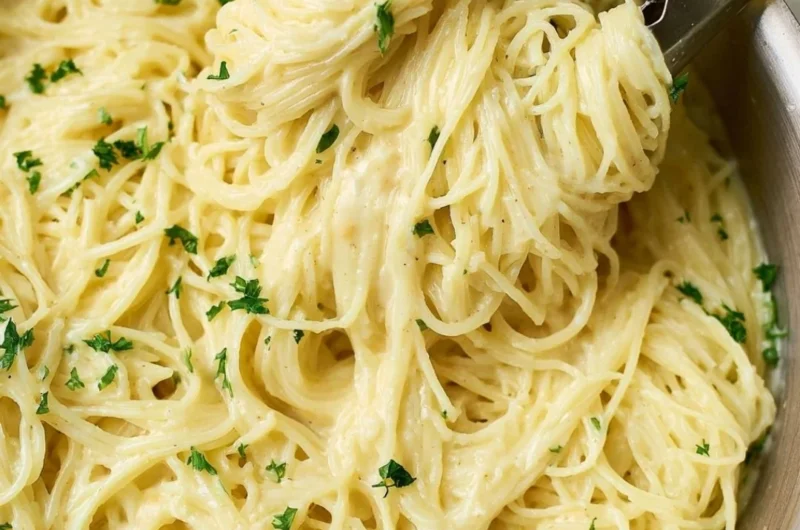 One Pot Garlic Parmesan Pasta with herbs and cheese served in a bowl