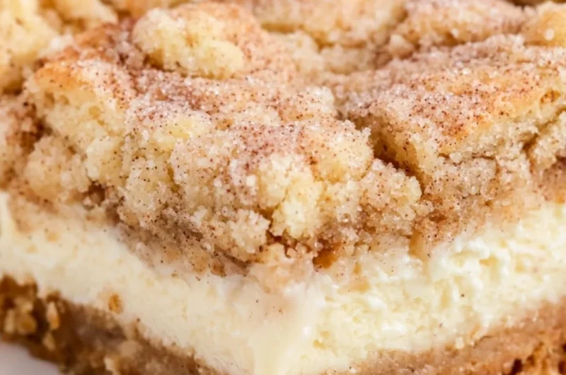 Delicious snickerdoodle cheesecake bars with a cinnamon topping