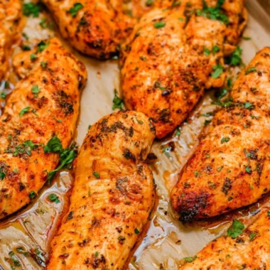 Crispy oven baked chicken tenders served with dipping sauce