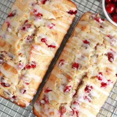 Freshly baked cranberry orange bread with cranberries and orange zest