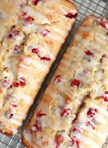 Freshly baked cranberry orange bread with cranberries and orange zest